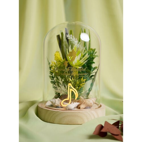 Disney-Prinzessin Ariel mit Blumenmuster in einer Glocke mit Neonlicht